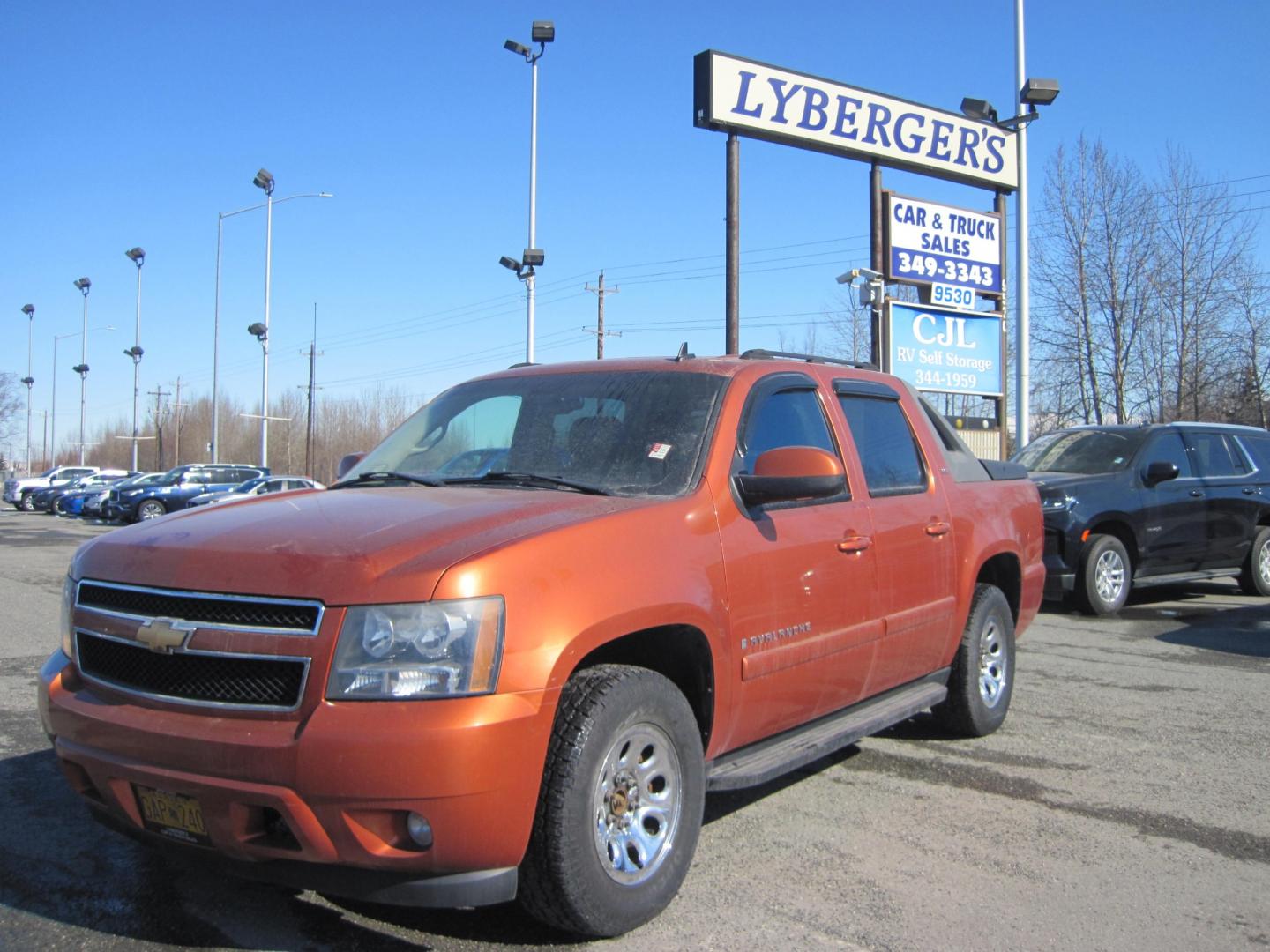 2007 Burnt Orange /Charcoal Chevrolet Avalanche LTZ 4WD (3GNFK12347G) with an 8 Cylinder Engine engine, Automatic transmission, located at 9530 Old Seward Highway, Anchorage, AK, 99515, (907) 349-3343, 61.134140, -149.865570 - Photo#0